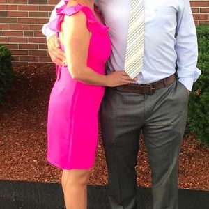 Bright pink flutter sleeve tie back dress